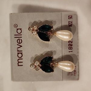 Marvella pearl earrings and inhancer. It's a set. Never worn
